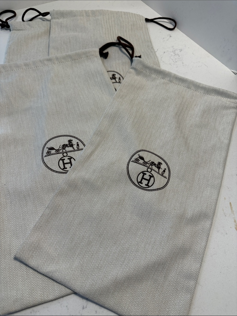 Four Hermes Dust bags